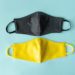 Reusable medical mask. Zero waste. Coronavirus epidemic. Protection against a virus. White background. Material for creativity fabric