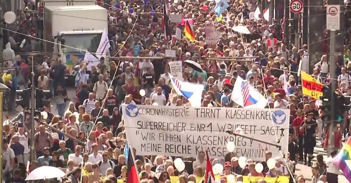 Protesters call for end of corona virus restrictions. Image credit: BBC