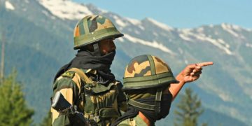 Indian soldiers guard a highway leading towards Leh in Ladakh. Image credit: AFP