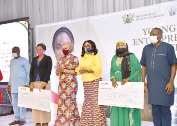 Some of the beneficiaries with dignitaries. Hajia Samira Bawumia (3rd from the left), Mrs. Cynthia Morrison (3rd from the right), Dr Mohammed Ibrahim Awal (right) and Mr. John Kumah (left), CEO of NEIP