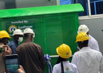 Dignitaries and SunPower  Innovations technical team commissioning the solar project
