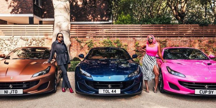 Temi and DJ Cuppy pose with new wheels