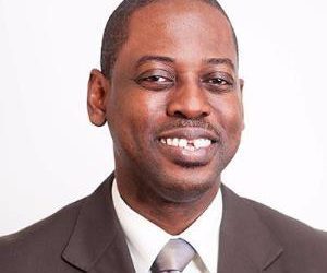 Reverend Daniel Ogbarmey Tetteh, Director-General of Securities and Exchange Commission (SEC).