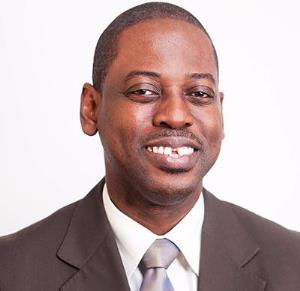 Reverend Daniel Ogbarmey Tetteh, Director-General of Securities and Exchange Commission (SEC).