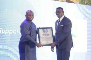Mr. Justice Yaw Ofori, the Commissioner of Insurance & CEO of the National Insurance Commission (NIC)  receiving his award.