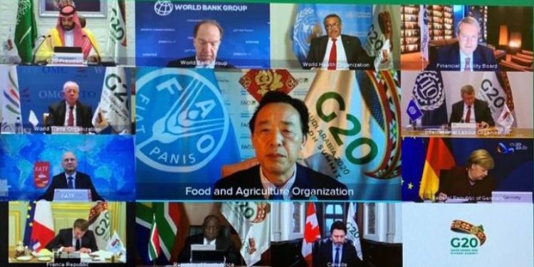 FAO's Director-General, Qu Dongyu (middle) speaking at the G20 Summit.