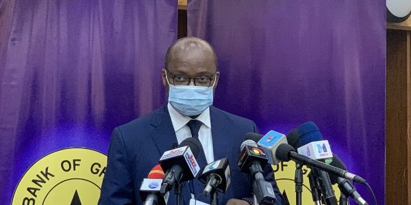 Dr. Addison addressing the press after the MPC meeting.