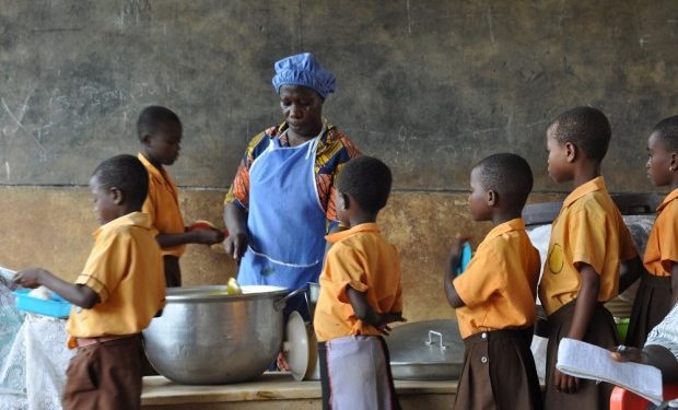 School Feeding Programme Caterers Resume Work 1 Caterer dishing out food to school kids