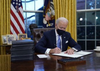 Biden revokes Trump ban on green card applicants