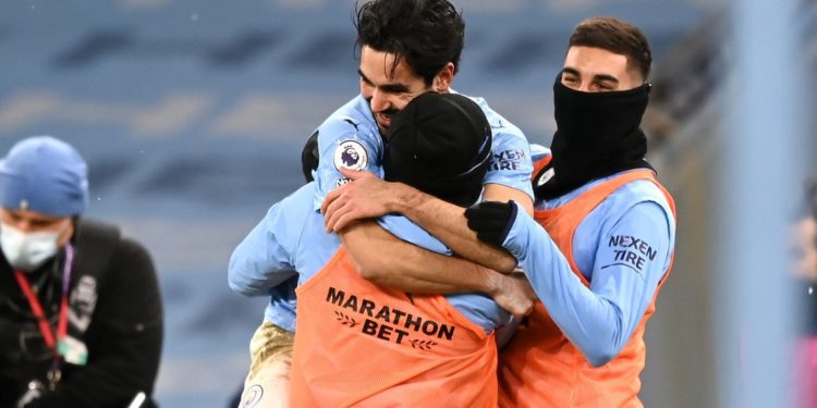 EPL Review: Man. City ease past Tottenham to stretch lead at the top
