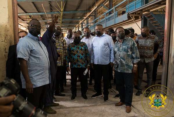 President Akufo Addo being taken on a tour of the facility
