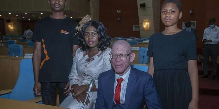 An albino activist was sworn into Malawi's parliament, a first in a country where people with albinism have suffered discrimination and killings.