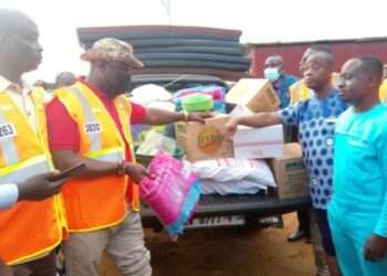 NADMO presenting relief items