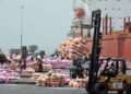 Ghana’s Export Earnings Surge 30.7% as Non-Traditional Exports Smash $5 Billion Record 2 Workers unload bags of rice on January 19, 2011 at the Port of Abidjan where 80% of Ivory Coast's exports transit. EU-registered ships have been barred from dealing with Ivory Coast's main cocoa ports in line with sanctions over the nation's controversial November presidential poll. The European Union last weekend slapped sanctions on outcast incumbent leader Laurent Gbagbo and 84 of his associates, as well as 11 economic entities in the world's top cocoa producer. AFP PHOTO/ ISSOUF SANOGO (Photo credit should read ISSOUF SANOGO/AFP/Getty Images)
