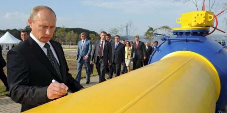 Russia Threatens to Stop Gas Supply if Payments are not in Roubles 1 President Vladimir Putin standing by one of Russia's gas pipeline
