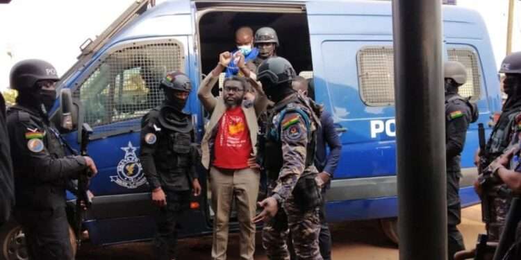 #FixTheCountry converner, Oliver Barker-Vormawor, being accompanied by the Ghana Police Service.