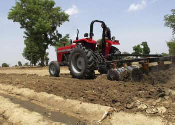 Farmer ploughing the field
