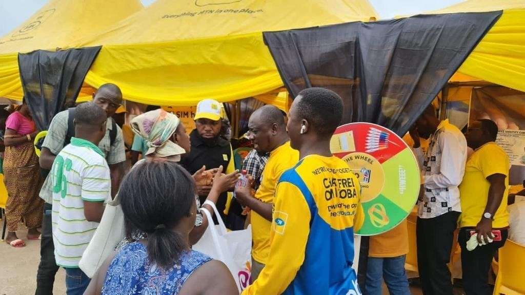 MTN Ghana Organizes SIM Registration Campaign As Part Of Its Global Appreciation Week 3 MTN Staff interacting with Customers in the Market 1