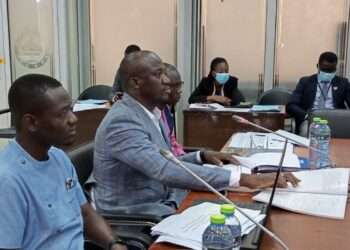 Dr. Abdul Nasir Alfa Mohammed, Vice Chair -PIAC answering questions at ad hoc committee sitting