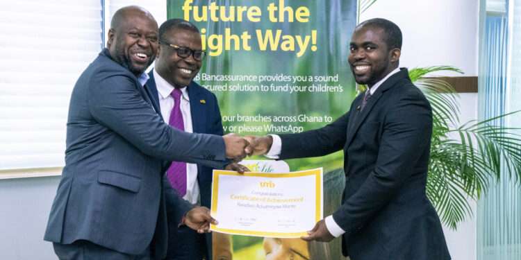 Kwadwo Aduameyaw Mante, Corporate Credit Officer of Universal Merchant Bank receiving his best student award qualifying him an educational trip to Kenya