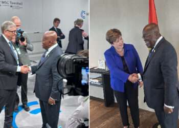 President Nana Addo in a handshake with Bill Gates on the left and Kristalina Georgieva, MD of IMF, on the right during MSC