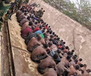 Some residents of Ashaiman lined up after a military swoop