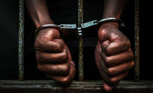 Hand cuffed Individual