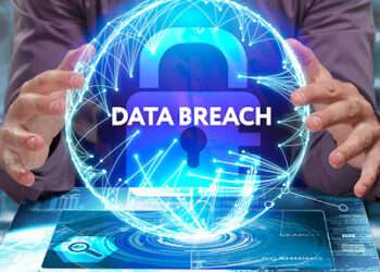 Business, Technology, Internet and network concept. Young businessman shows the word on the virtual display of the future: Data breach