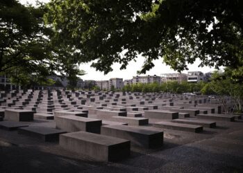 The morning light illuminate the Memorial to the Murdered Jews of Europe, or the Holocaust Memorial in Berlin, Germany, Thursday, June 15, 2023.