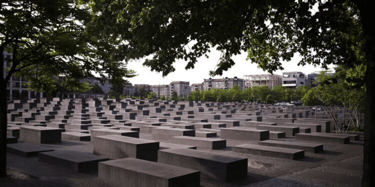 The morning light illuminate the Memorial to the Murdered Jews of Europe, or the Holocaust Memorial in Berlin, Germany, Thursday, June 15, 2023.