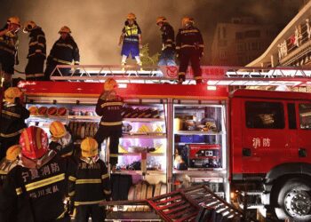 Firefighters work at the site of an explosion at a restaurant in Yinchuan, northwest China's Ningxia Hui Autonomous Region Wednesday, June 21, 2023.