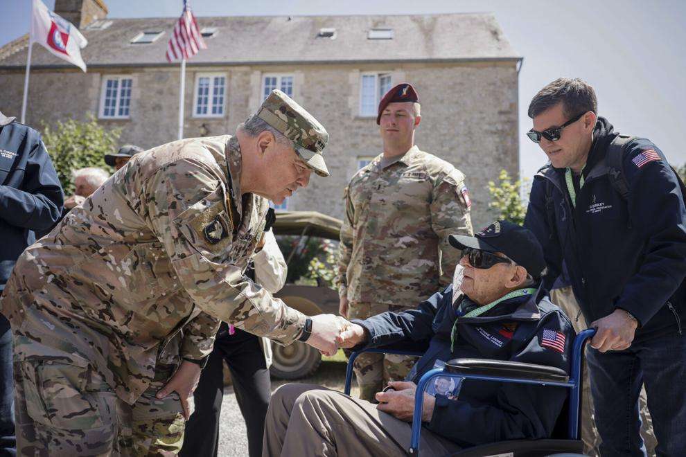 The Normandy Landing, 79th Anniversary of D-Day 6 U.S. Gen. Mark Milley left shakes hands with Tec4 Moshe D. Lenske during a gathering in preparation of the 79th D Day anniversary in La Fiere Normandy France