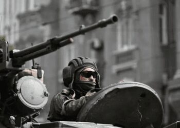 A fighter from Wagner group is seen atop an armoured vehicle in a street near the headquarters of the Southern Military District in the city of Rostov-on-Don, Russia, June 24, 2023