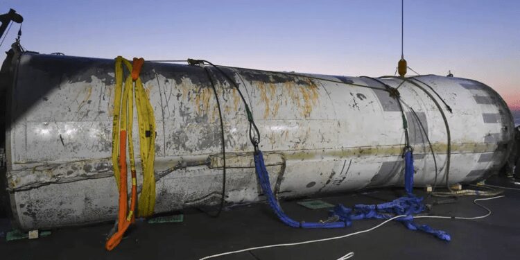This photo provided by South Korea's Defense Ministry shows an object salvaged by South Korea's military that is presumed to be part of the North Korean space-launch vehicle that crashed into sea following a launch failure, in West Sea, South Korea.