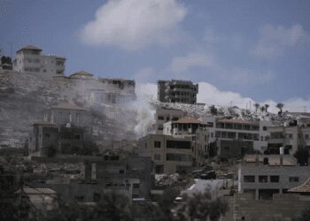 Smoke rises from fighting between Israeli forces and Palestinian militants in the West Bank city of Jenin Monday, June 19, 2023.