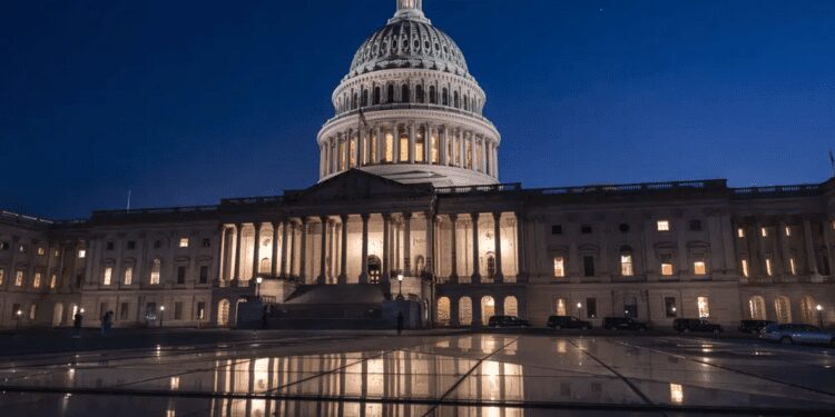 The Capitol is illuminated as the Senate works into the night to finish votes on amendments on the big debt ceiling and budget cuts package, at the Capitol in Washington, Thursday evening, June 1, 2023.