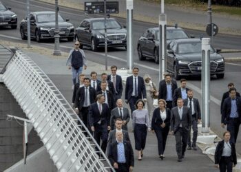 Finance Minister Christian Lindner, Chancellor Olaf Scholz, Foreign Minister Annalena Baerbock, Interior Minister Nancy Faeser and Defense Minister Boris Pistorius, from left, walk to a press conference to introduce the new German security strategy in Berlin, Wednesday, June 14, 2023.