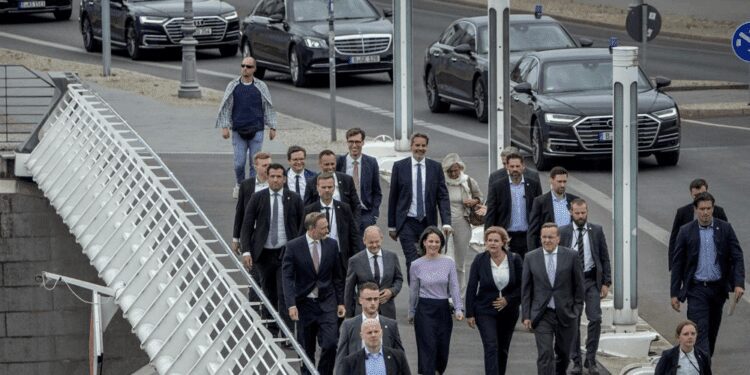 Finance Minister Christian Lindner, Chancellor Olaf Scholz, Foreign Minister Annalena Baerbock, Interior Minister Nancy Faeser and Defense Minister Boris Pistorius, from left, walk to a press conference to introduce the new German security strategy in Berlin, Wednesday, June 14, 2023.