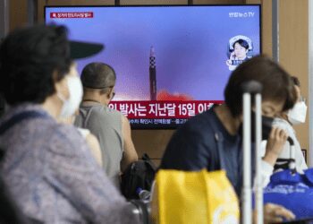 A TV screen shows an image of North Koreas missile launch during a news program at the Seoul Railway Station in South Korea on Wednesday, July 12, 2023.