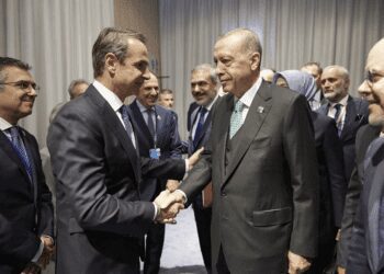 Prime Minister of Greece, Kyriakos Mitsotakis, left, shakes hands with Turkish President, Recep Tayyip Erdogan on Wednesday, July 12, 2023.