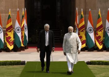 Indian Prime Minister Narendra Modi welcomes Sri Lankan President Ranil Wickremesinghe walk for a photo call before their delegation level meeting in New Delhi, India, Friday, July 21, 2023.