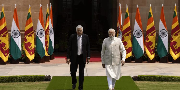 Indian Prime Minister Narendra Modi welcomes Sri Lankan President Ranil Wickremesinghe walk for a photo call before their delegation level meeting in New Delhi, India, Friday, July 21, 2023.