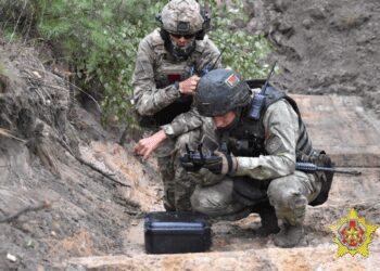 A Wagner Group fighter and a Belarusian special forces member in a joint training exercise at the Brest military range outside Brest, Belarus.