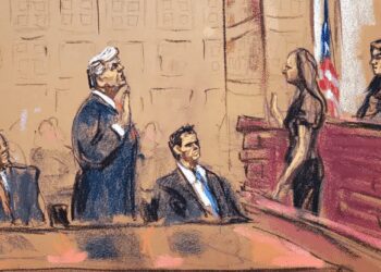In this courtroom sketch, Former U.S. President, Donald Trump stands between his attorneys Todd Blanche and John Lauro as he takes an oath before Magistrate Judge Moxila A. Upadhyaya during his plea hearing on charges that he orchestrated a plot to try to overturn his 2020 election loss, at federal court in Washington, U.S. August 3, 2023 .