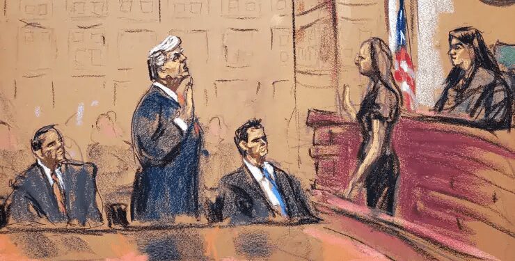 In this courtroom sketch, Former U.S. President, Donald Trump stands between his attorneys Todd Blanche and John Lauro as he takes an oath before Magistrate Judge Moxila A. Upadhyaya during his plea hearing on charges that he orchestrated a plot to try to overturn his 2020 election loss, at federal court in Washington, U.S. August 3, 2023 .