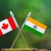Canadian and Indian flags.