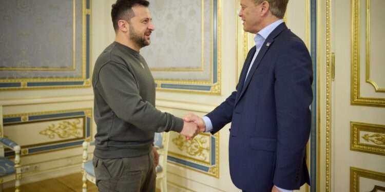 Volodymyr Zelenskyy, President of Ukraine, left, shakes hands with British Defence Secretary, Grant Shapps.