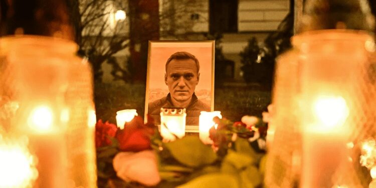 Russia To Bid Navalny Goodbye 1 Framed picture of Alexei Navalny.