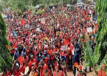 Protestors marching against the sale of SSNIT Hotels