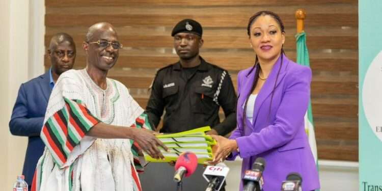 Honourable Johnson Asiedu Nketiah handing-over the  nomination forms to Madam Jean Mensa, Chairperson, EC